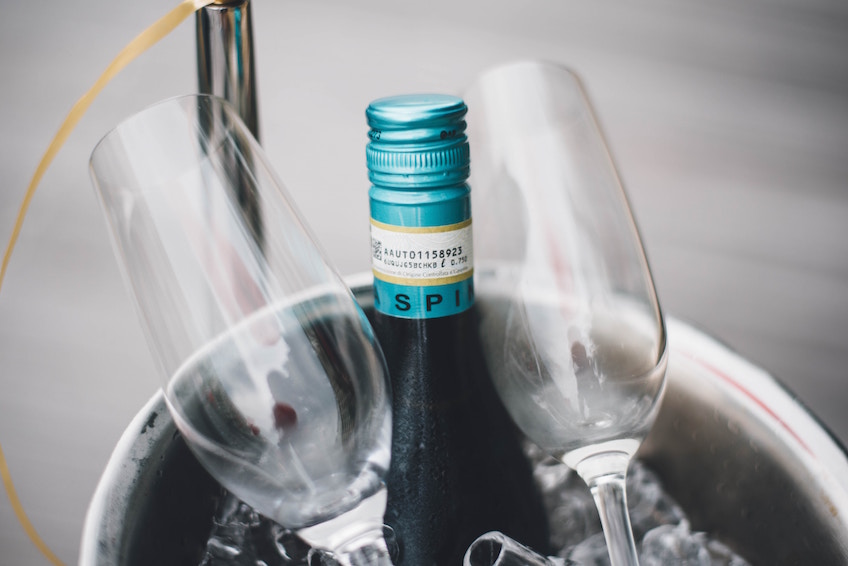 Ice bucket with wine and glasses